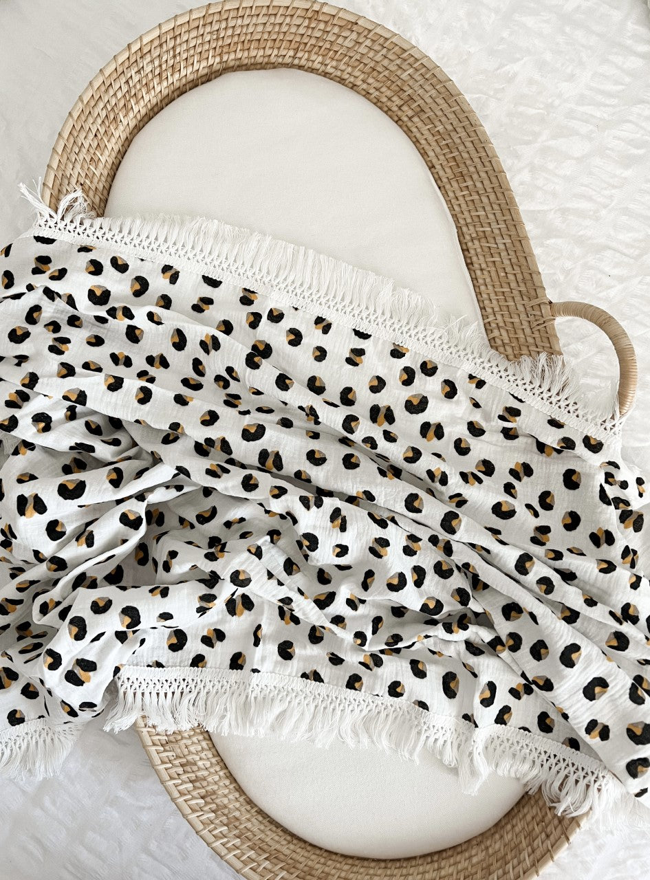 Leopard fringe swaddle