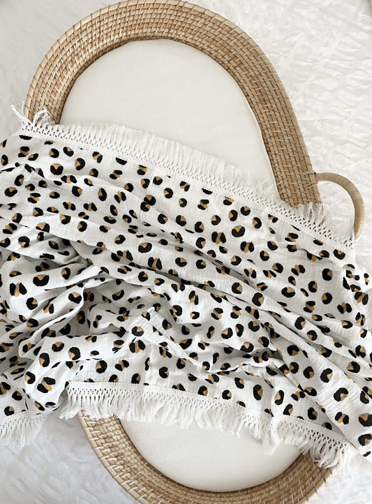 Leopard fringe swaddle