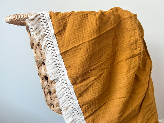 Rust Fringe Swaddle